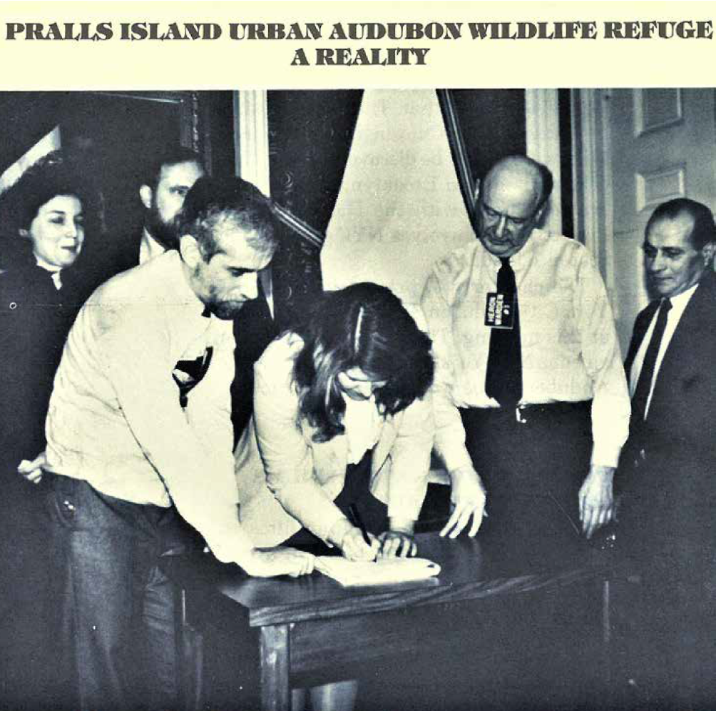 Mayor Edward I. Koch signs a management agreement for Prall’s Island with NYC Parks/NYC Bird Alliance on Thursday, February 21, 1985. Pictured (left to right): past Board Member Peggy Kane, past Board President and Vice President Albert F. Appleton, NYC Parks Commissioner Henry Stern, past Board President and Vice President Bette Brookshire-McGrath, Mayor Edward Koch, and Wally Popolizio. Photo: Mitch Heiberg